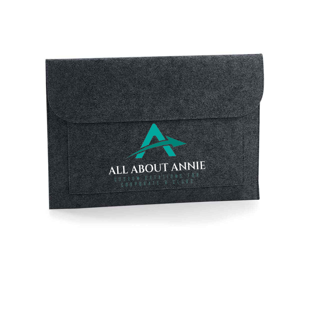 A white felt laptop and document sleeve with the brand 'All About Annie' displayed on the front.